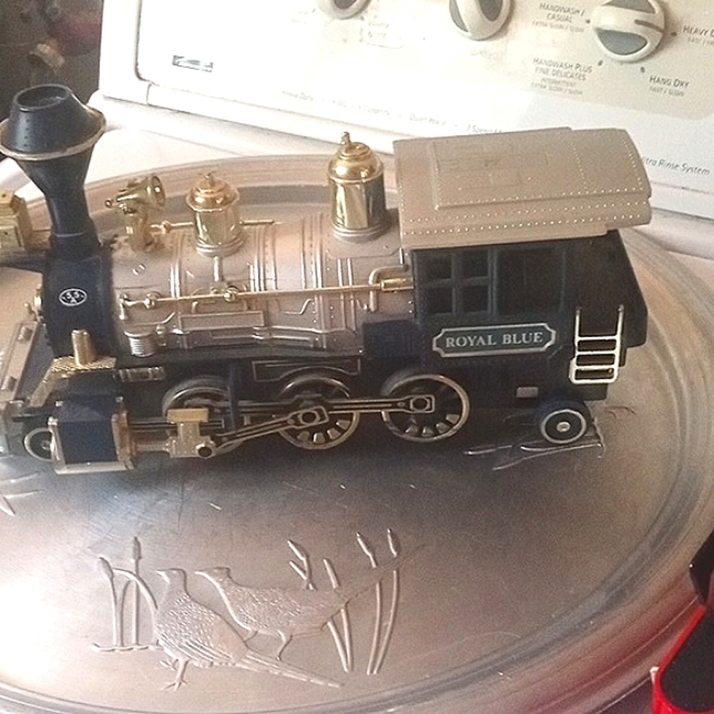 Royal Blue train toy collector model . Runs in batteries.  Great condition.